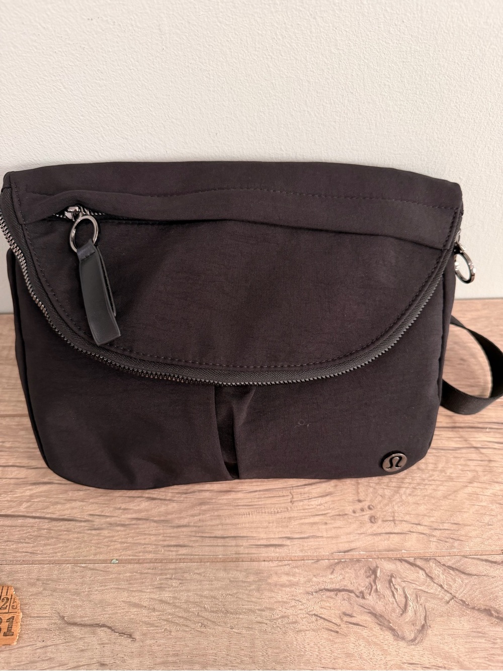 e Lululemon All Night Festival Bag 5L folded front flap Black Accents 9.5 by 9”